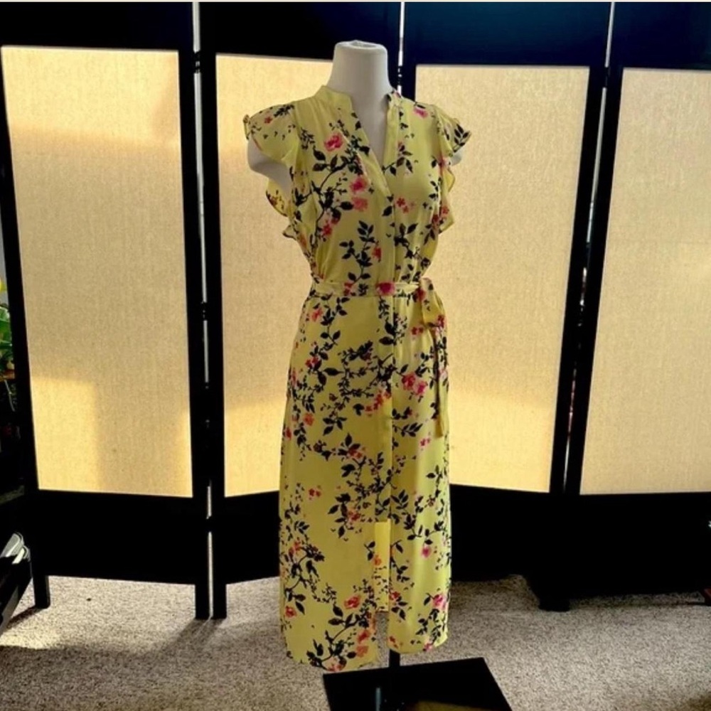 Maison Jules Yellow midi dress with floral pattern.